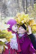 © lozochka - mother and  children in autumn