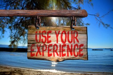 Wall Mural - Use your experience motivational phrase sign