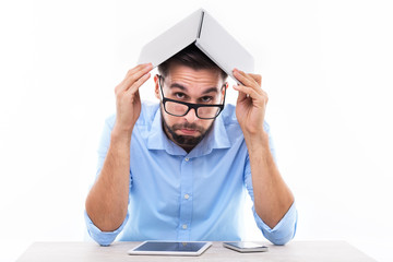 Wall Mural - Man holding laptop over head