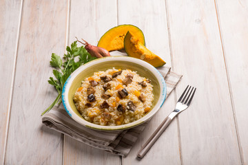 Wall Mural - risotto with pumpkin and mushroom