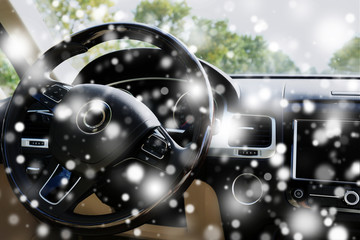 Sticker - Modern car interior. Steering wheel over snow effect