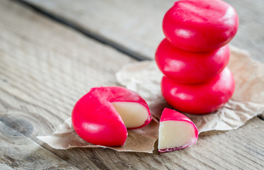 Sticker - Stack of mini cheese on the wooden table