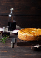 Wall Mural - Pot Meat Pie with wine Wooden background 