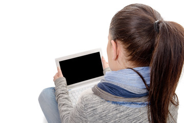 back view of beautiful business woman holding laptop with empty