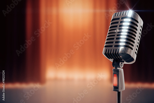 Fotografie, Tablou Vintage microphone at stage background