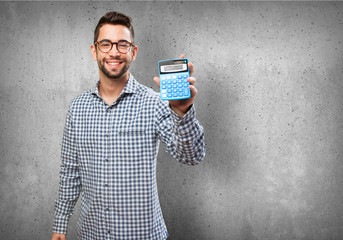 man holding a calculator