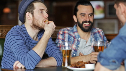 Sticker - happy male friends drinking beer at bar or pub