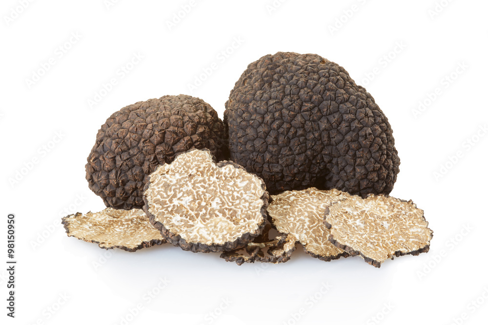 Black truffles group and slices isolated on white, clipping path - obrazy, fototapety, plakaty 