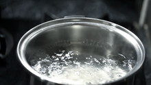 clean boiling water in a pan 
