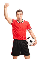 Poster - Young football player gesturing success