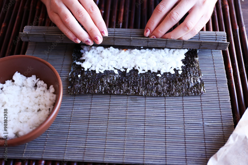 The process of making sushi and rolls