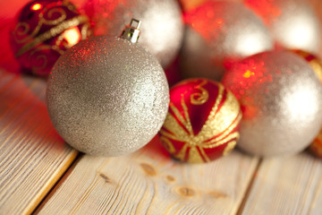 Sticker - Christmas baubles on wooden background