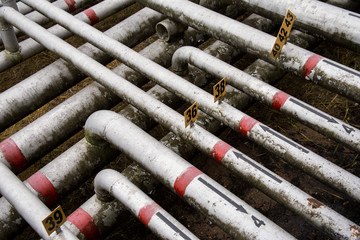 Wall Mural - array of old pipes with arrows