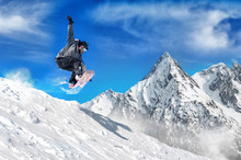 Extreme Snowboarding Man / Snowboarder Jumping High In The Air