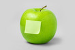 Green Apple and blank note on white background