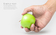 Hand hold Green Apple on white background
