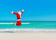 Santa Claus flying against sea beach and sky, Christmas concept