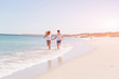 © Sergey Nivens - Romantic young couple on the beach