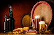 beer and food on rustic background