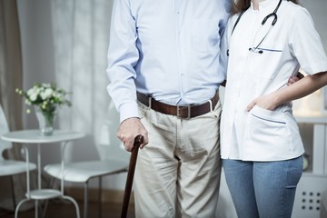 Wall Mural - Elder man and his nurse