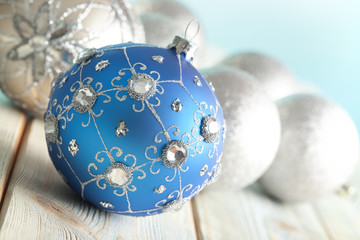 Christmas baubles on wooden background