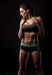 © Zdenka Darula - fitness woman on black background