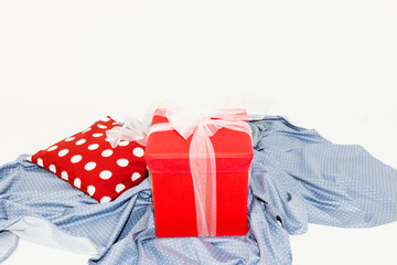 Close-up of big red gift box on white background with copyspace