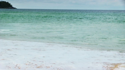 Wall Mural - Nice tropical beach and sea wave.
