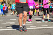 © Iuliia Sokolovska - Marathon running race, runners feet on road, sport, fitness and healthy lifestyle concept