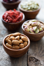 Variety Of Nuts And Dried Fruits In Small Bowls