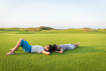 The best summer holiday vacation laying on perfect green grass