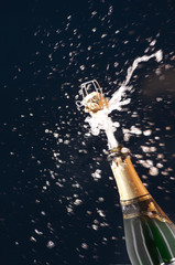 Close-up of champagne explosion