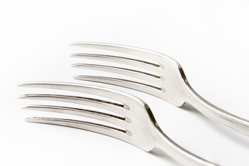 Silver fork on white background.