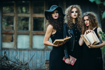 three vintage women as witches