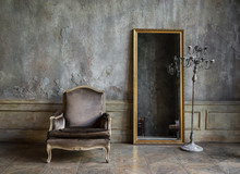 In The Room Are Antique Mirror And A Chair