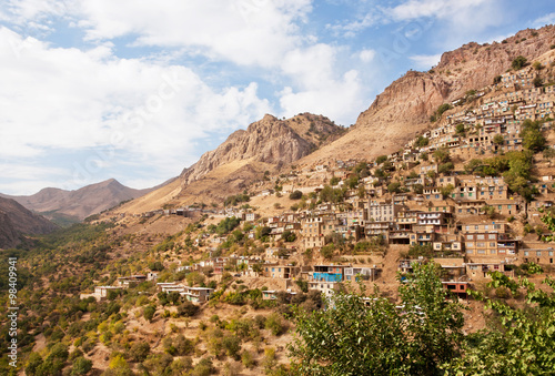 Valokuva  Rural landscape with clay and brick houses in mountain village