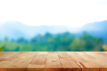 Poster - Wood table top on blur mountain background