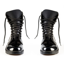 Black Leather Army Boots On White Background