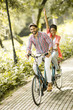 © BGStock72 - Young couple riding on the bicycle