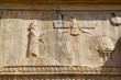 Faravahar Royal tombs facade, symbol on the ruins of old city Pe