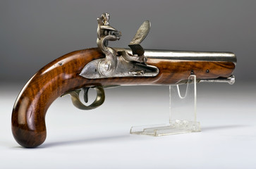 Wall Mural - Antique English Flintlock Pistol.