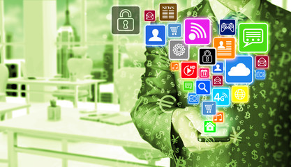 Business man using smart phone with social media icon set