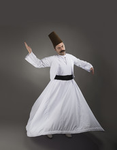 Full Length Image Of A Mevlana Dervish Over Gray