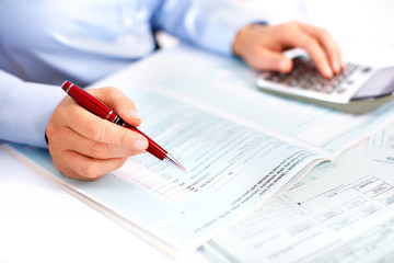 Fototapete - Hands of accountant business woman with calculator.
