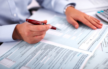 Aufkleber - Hands of accountant business woman with calculator.
