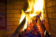 Burning logs in fireplace.