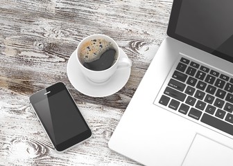 Canvas Print - Laptop smartphone and coffee cup on wood table