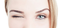 Close-up With Beautiful Woman Eyes And Wink