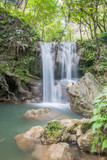 Fototapeta Góry - beautiful forest waterfall in Thailand,