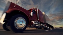 Oncoming Huge Semi-trailer Truck Riding On The Highway. Closeup Animation. HD